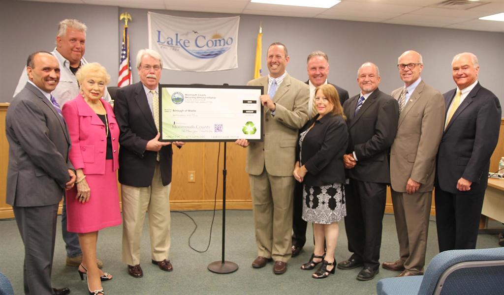 The Monmouth County Board of Chosen Freeholders and the Monmouth County Clean Communities staff presented the Borough of Brielle with a $6,000 Recycling Stimulus Initiative Grant at the Freeholders’ regular public meeting on June 25. Pictured left to right: Freeholder Thomas A. Arnone, Recycling Coordinator Bob McArthur, Freeholder Lillian G. Burry, Mayor Thomas B. Nicol, Stuart Newman, William Johnson, Fran Metzger, Richard Throckmorton, Freeholder Director Gary J. Rich, Sr. and Freeholder John P. Curley.